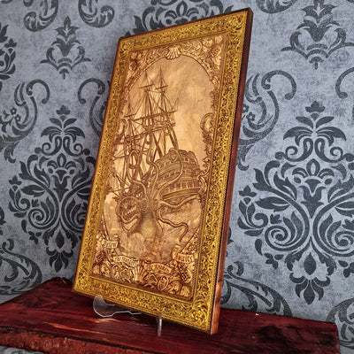 Engraved woodcut wall art of Kraken sea monster attacking sailing boat, nautical maritime décor