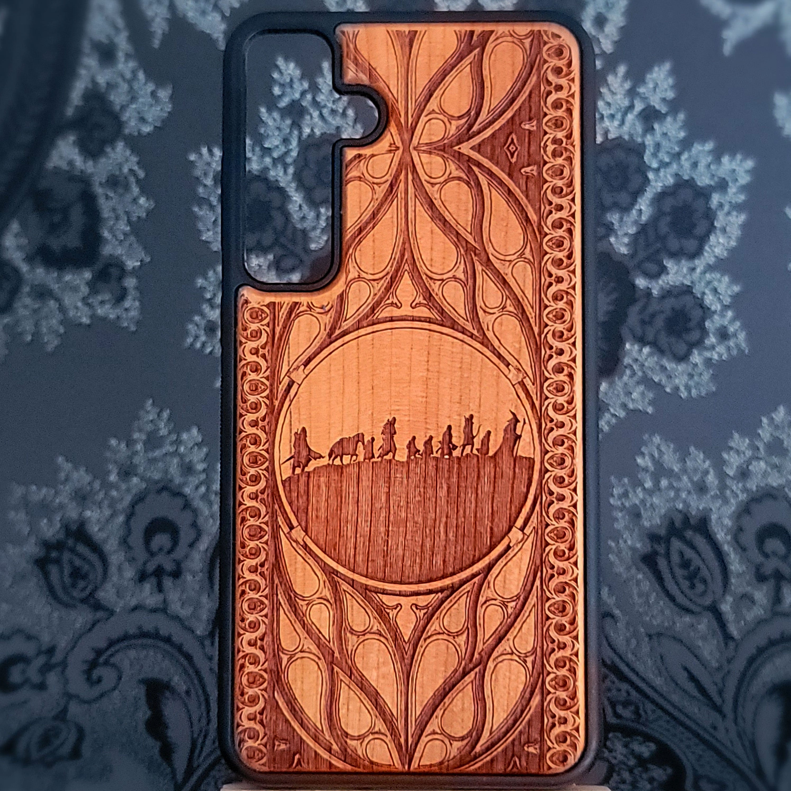 Lord of the Rings wood phone case featuring the Fellowship of the Ring silhouette 