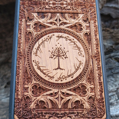Wooden phone case with a detailed laser-engraved Gothic design, featuring intricate patterns and an elegant look. Compatible with iPhone , 15, 14, 13, 12, 11 Pro Max Mini and Samsung Galaxy S, S24, S23, S22, S21, S20 Ultra, Plus, Note 20. A perfect accessory for gothic art enthusiasts.