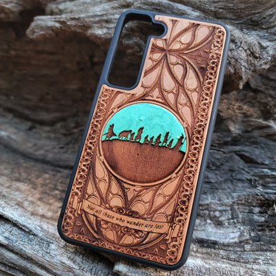 Lord of the Rings Fellowship wood phone case featuring laser-engraved design of the Fellowship of the Ring. Compatible with iPhone , 15, 14, 13, 12, 11 Pro Max Mini, and Samsung Galaxy S, S24, S23, S22, S21, S20 Ultra Plus, Note 20. Unique, stylish, and protective for fans of Middle-Earth.