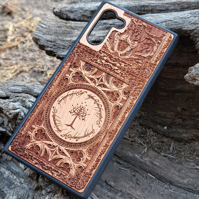 Wooden phone case with a detailed laser-engraved Gothic design, featuring intricate patterns and an elegant look. Compatible with iPhone , 15, 14, 13, 12, 11 Pro Max Mini and Samsung Galaxy S, S24, S23, S22, S21, S20 Ultra, Plus, Note 20. A perfect accessory for gothic art enthusiasts.