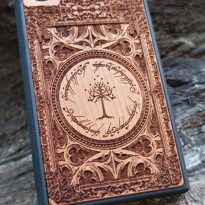 Wooden phone case with a detailed laser-engraved Gothic design, featuring intricate patterns and an elegant look. Compatible with iPhone , 15, 14, 13, 12, 11 Pro Max Mini and Samsung Galaxy S, S24, S23, S22, S21, S20 Ultra, Plus, Note 20. A perfect accessory for gothic art enthusiasts.