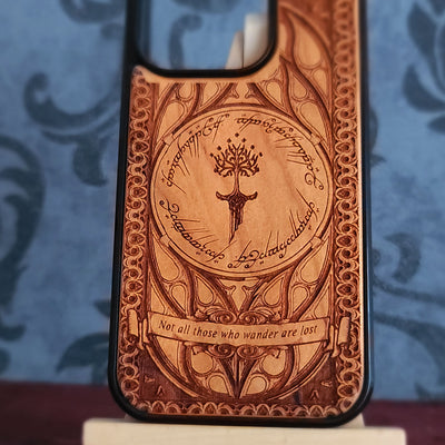 Lord of the Rings wood phone case featuring the White Tree of Gondor, Elvish script, and the iconic quote 'Not all those who wander are lost.' Laser-engraved for intricate detailing and crafted for durability, this case is compatible with iPhone and Samsung Galaxy 