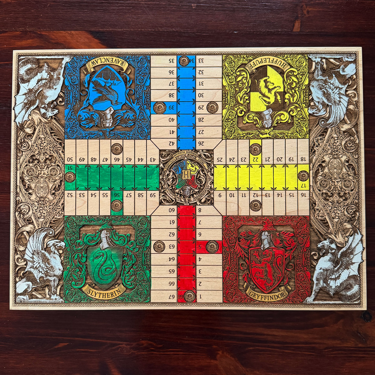 Harry Potter wooden Parcheesi board with Gryffindor Slytherin Ravenclaw and Hufflepuff house artwork