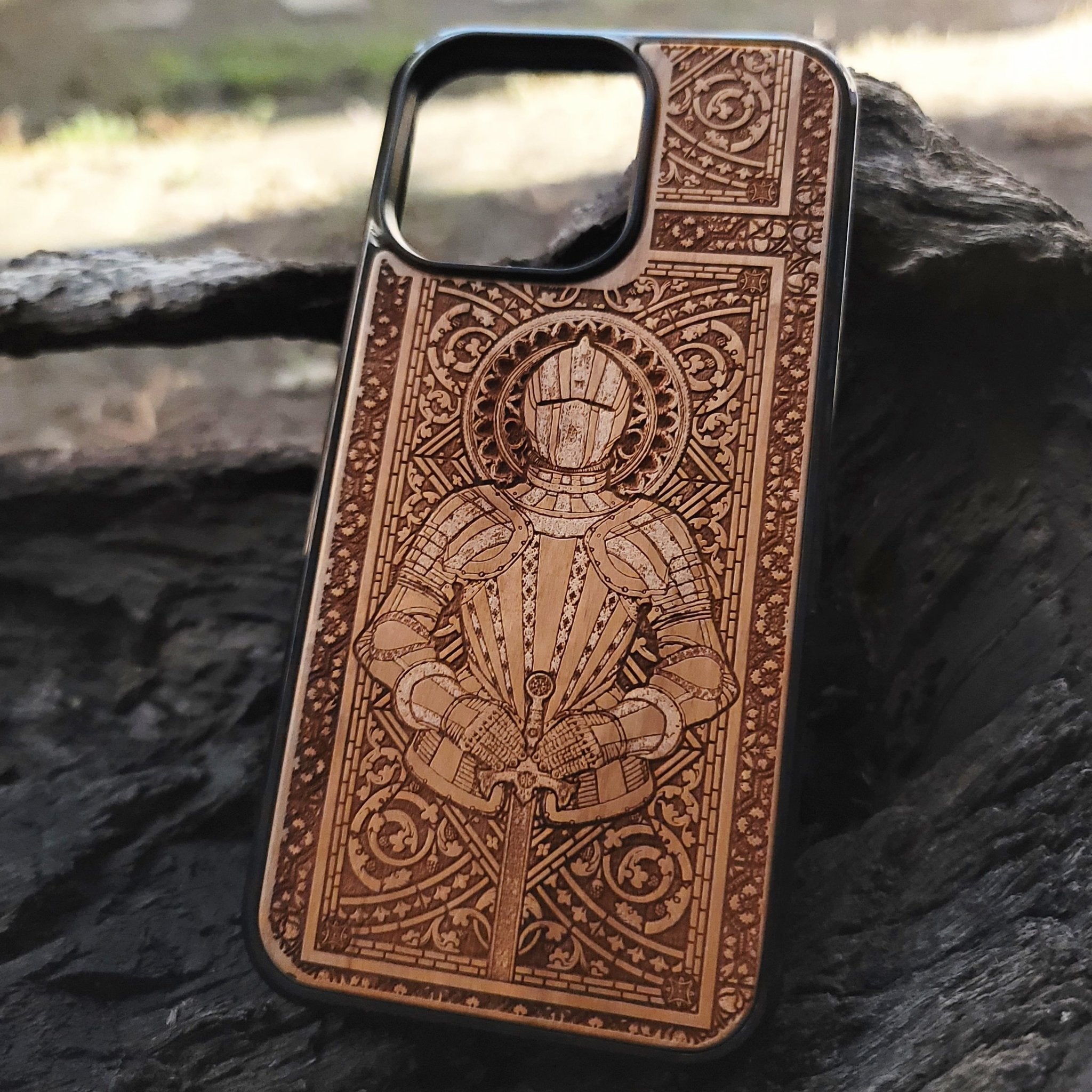 Wooden phone case with detailed engraving of medieval knight armor, perfect for iPhone , iPhone 15, Galaxy S, and other models. Ideal for fans of gothic, medieval, and knight-themed designs.