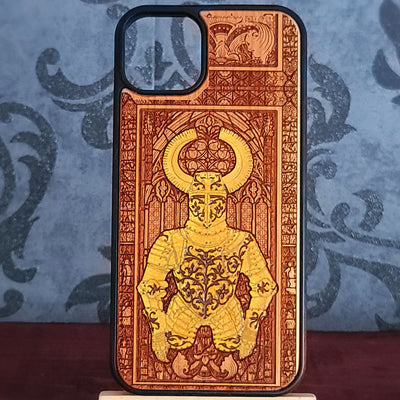 A phone case featuring a detailed, hand-carved or printed illustration of a knight in golden armor with a large golden halo, set against a warm reddish-brown background with gothic architectural details. 