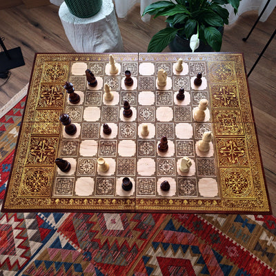 Large decorative wooden chessboard with engraved medieval war design and natural maple wood finish