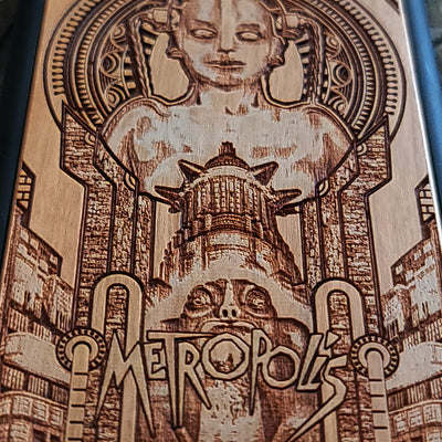 Metropolis wooden phone case with intricate Art Deco design, laser-engraved for iPhone , iPhone 15, Galaxy S, Note 20, and more. A unique accessory for fans of classic films and vintage style.