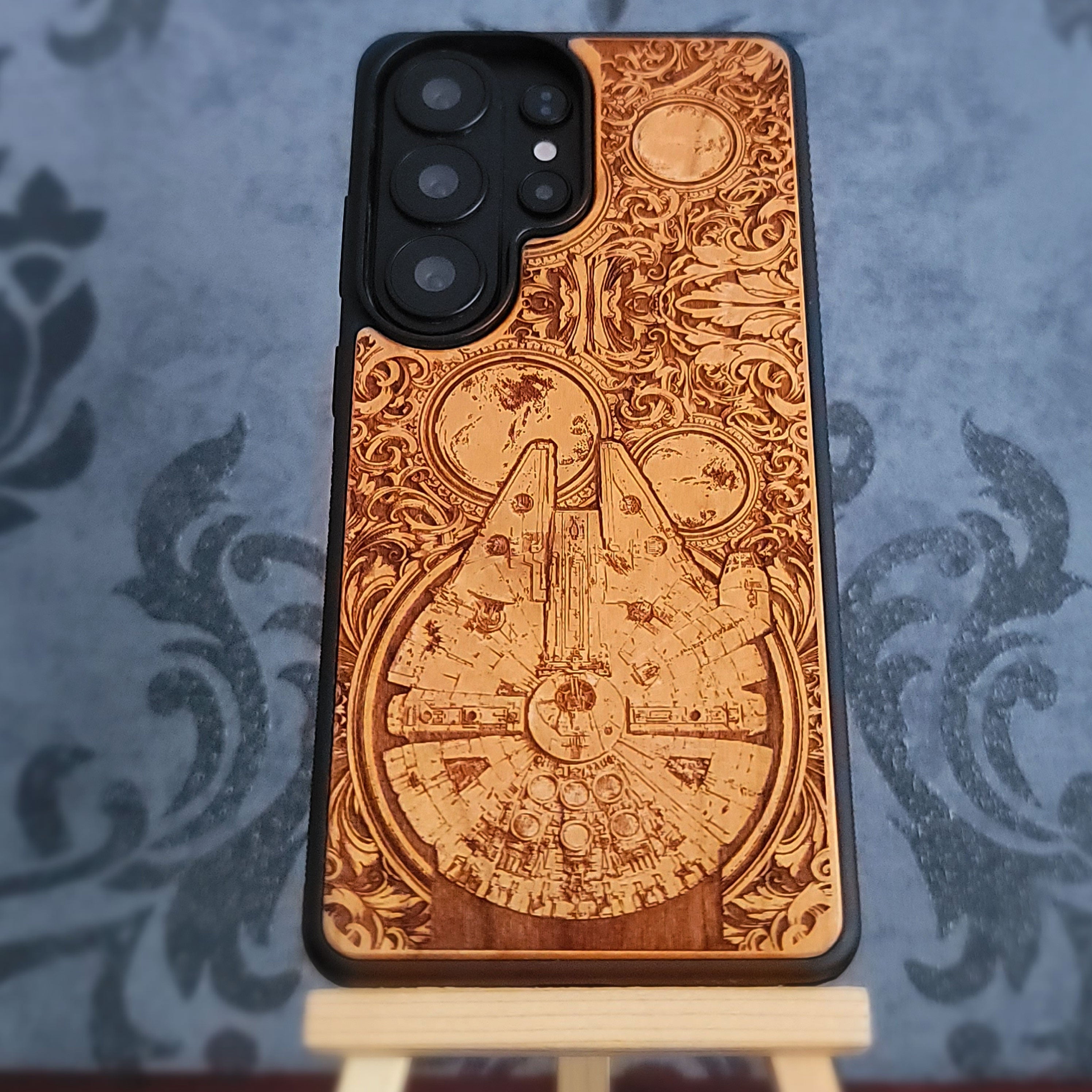 star wars wood phone case featuring the millennium falcon ship