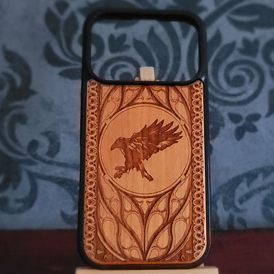 Gothic bird phone case featuring flying raven and ornate engraved wood design