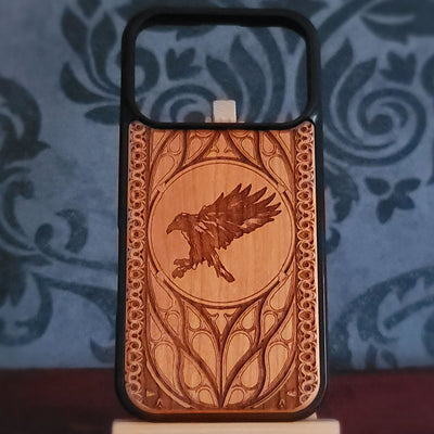 Raven laser engraved on real cherrywood phone case with gothic ornamental frame