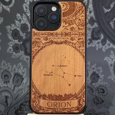 laser engraved wooden phone case featuring the Orion constellation with celestial star details on natural wood for iPhone and Samsung Galaxy models.