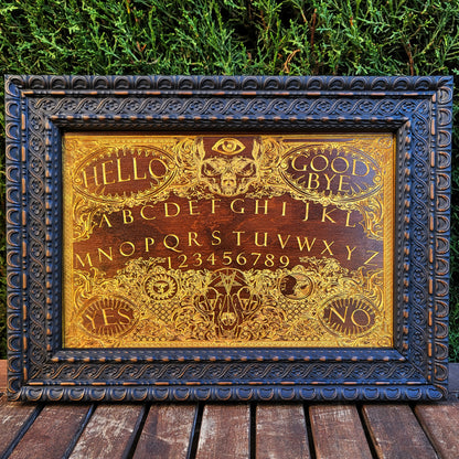 Dark spirit board design in wood, perfect for witchy home or altar wall decor.