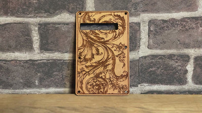 Handcrafted wooden floral tremolo cover, compatible with Stratocaster guitars.