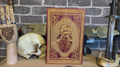 Red anatomical heart wood art for fans of horror, medicine, and tattoo art.