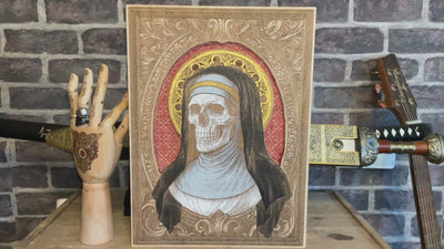 Sister and skull woodcut art with hand-painted gothic elements.