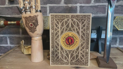 Detailed fantasy wood carving of Sauron’s Eye, ideal for collectors.