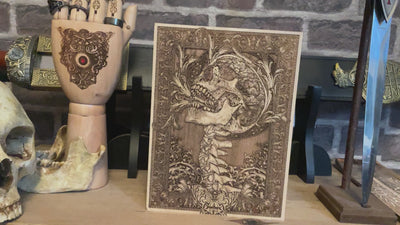Laser-engraved gothic skull on natural wood, a bold piece for collectors of anatomical and dark artwork.