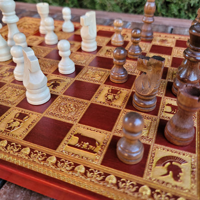 Ornate Roman-style chessboard with wood-stained detailing, perfect for strategy game lovers and special occasion gifts.