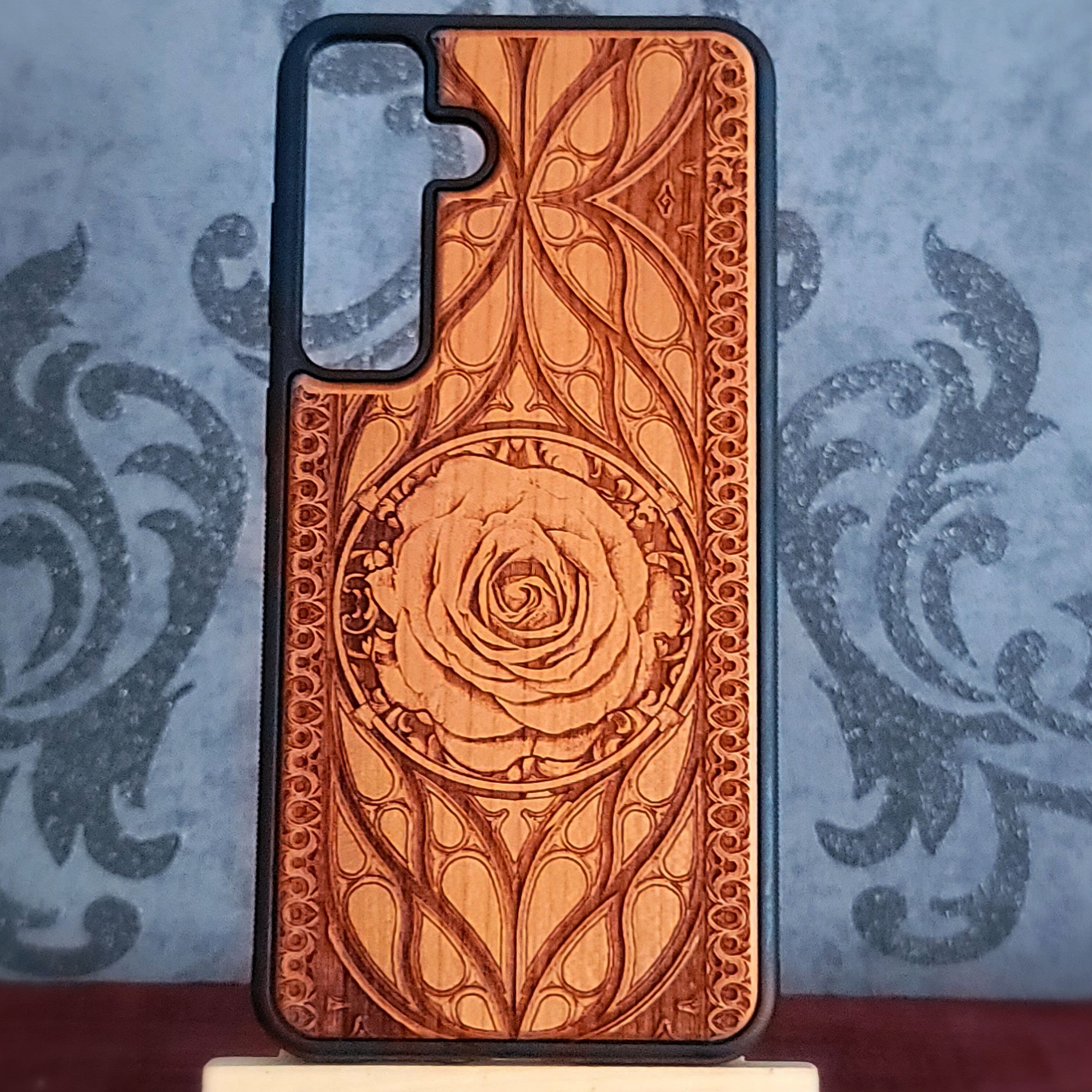 Laser-engraved wooden phone case with intricate rose design, slim, durable