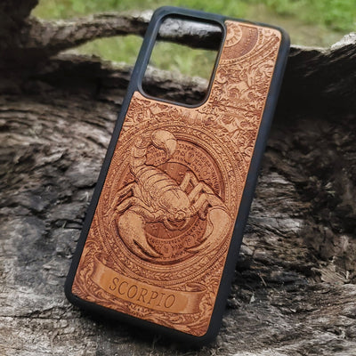 Engraved Scorpio astrology design on durable wood phone cover