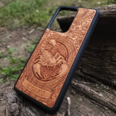 Scorpio zodiac symbol etched into stylish wood phone case