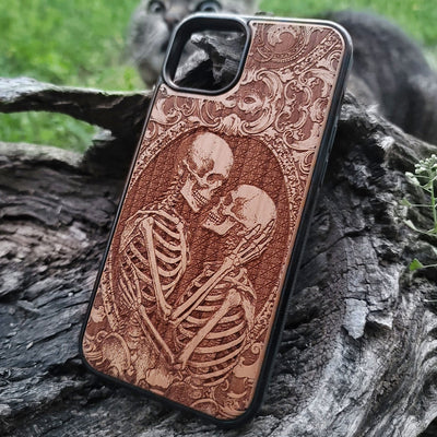 Gothic skeleton couple kissing engraved on a wooden phone case, compatible with iPhone  and Samsung Galaxy S.