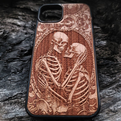 Gothic skeleton couple kissing engraved on a wooden phone case, compatible with iPhone  and Samsung Galaxy S.