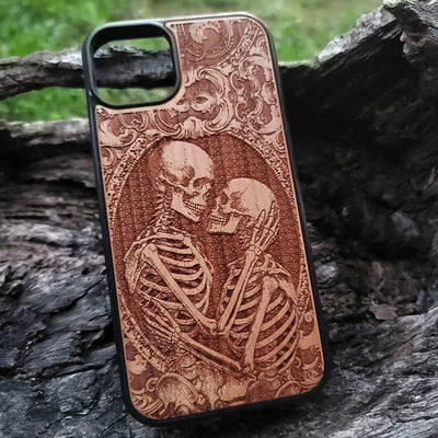 Gothic skeleton couple kissing engraved on a wooden phone case, compatible with iPhone  and Samsung Galaxy S.