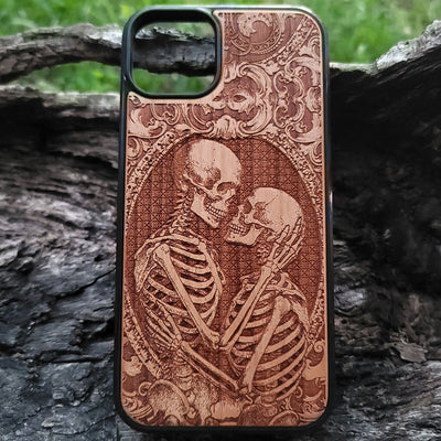 Gothic skeleton couple kissing engraved on a wooden phone case, compatible with iPhone  and Samsung Galaxy S.