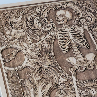 Halloween-themed skull couple artwork with customizable engraving.