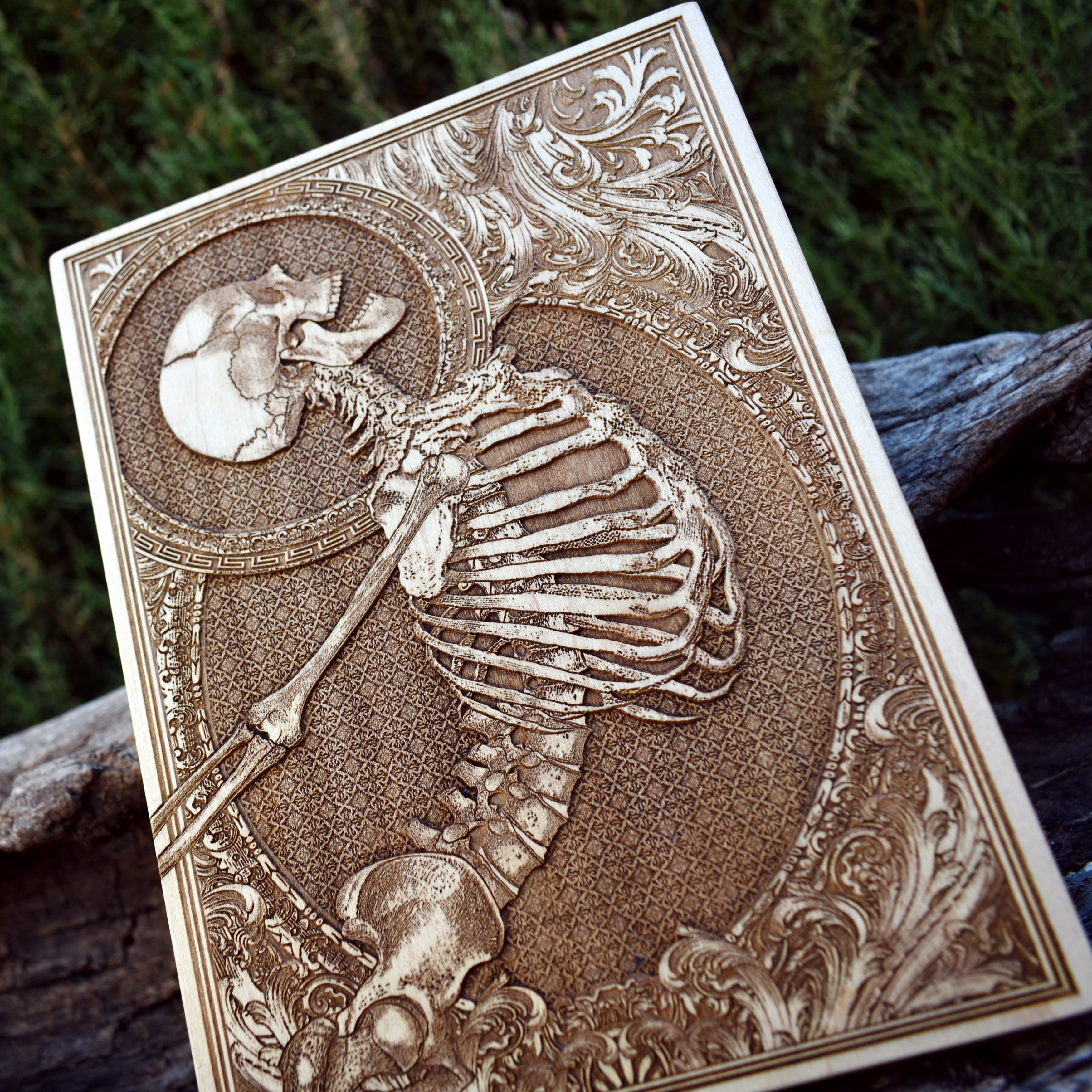 Dark aesthetic wood engraving - detailed skull design on premium wood
