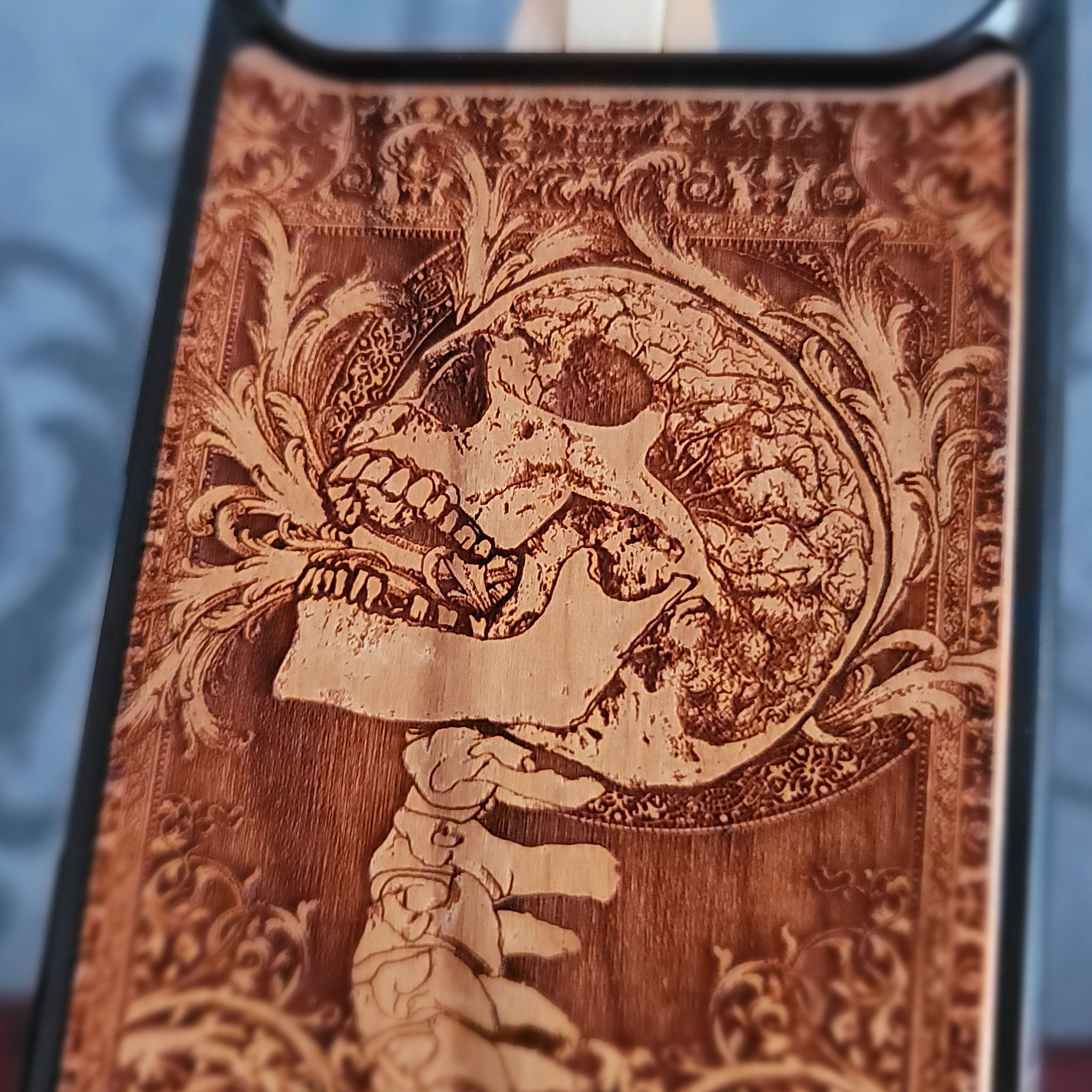 Engraved gothic skull wood phone case for iPhoneand  Galaxy – dark art skeleton design.