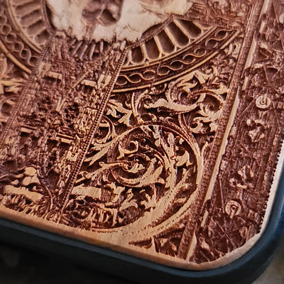 Gothic wooden phone case featuring an intricate skull and horns design. Handcrafted for iPhone  and Galaxy S, perfect for lovers of gothic art and unique phone accessories.