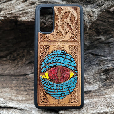 Snake eye gothic artwork engraved on a wooden phone case, compatible with iPhone  and Samsung Galaxy S.