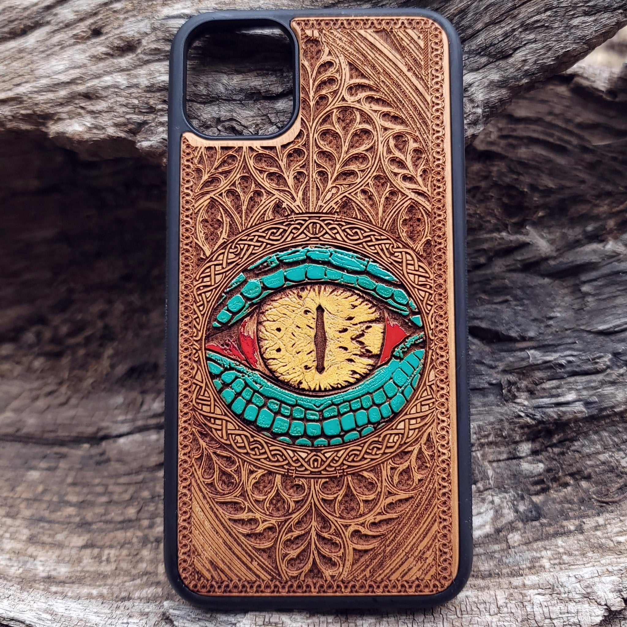 Cherry wood phone case with laser-engraved Snake Eye Gothic design, compatible with iPhone & Samsung Galaxy.
