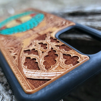 Gothic snake eye artwork engraved on a wooden phone case, compatible with iPhone  and Samsung Galaxy S.