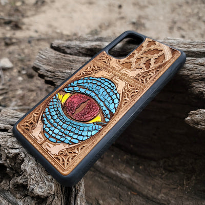Snake eye gothic artwork engraved on a wooden phone case, compatible with iPhone  and Samsung Galaxy S.