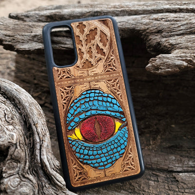 Snake eye gothic artwork engraved on a wooden phone case, compatible with iPhone  and Samsung Galaxy S.