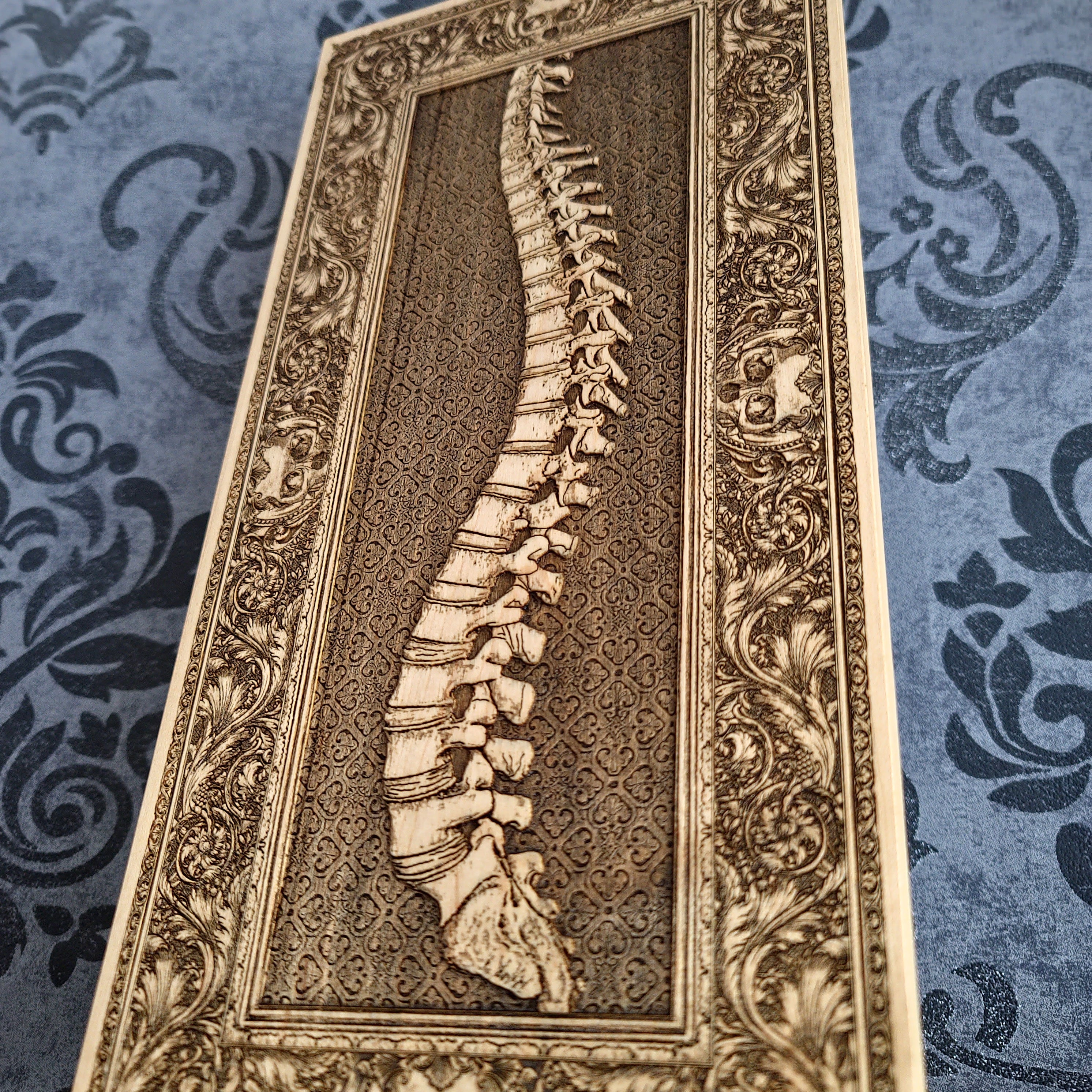 Handcrafted human spine wood engraving, laser-engraved on solid maple wood without paint. A medical-themed gift for doctors, chiropractors, anatomy lovers, and healthcare professionals.