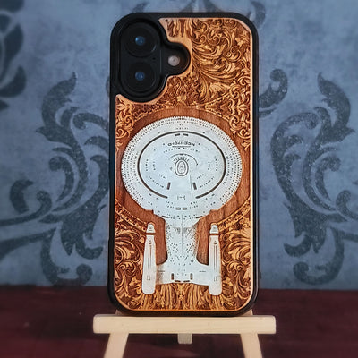 Enterprise NCC-1701-D hand-painted cherrywood phone case, close rear view of the white starship and scrollwork