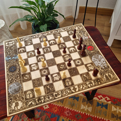 Decorative chessboard with pieces on a wooden table
