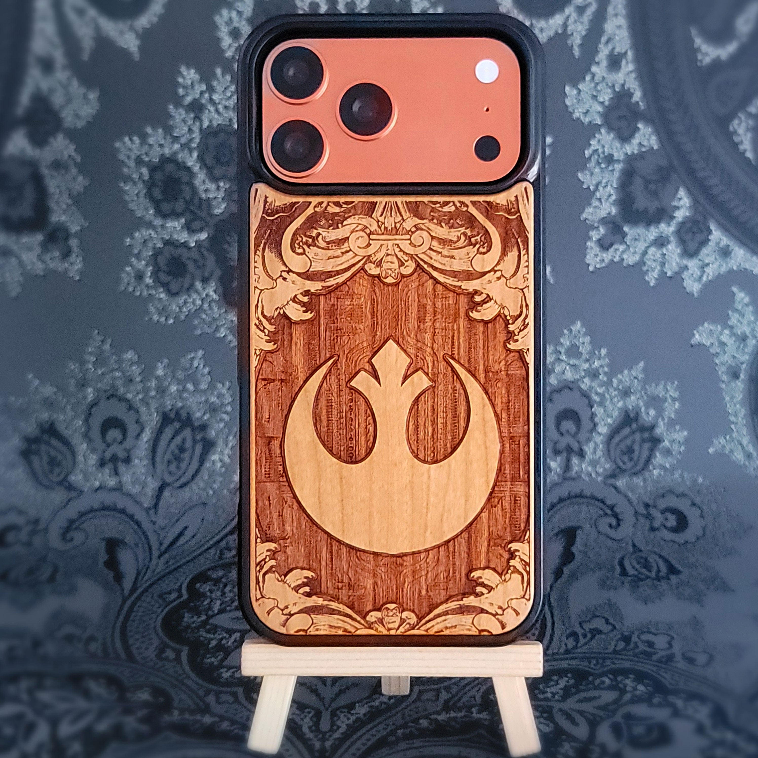 Star wars inspired wood phone case featuring a double laser-engraved design of&nbsp;The Rebel Logo.