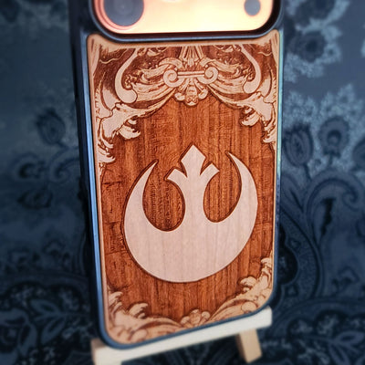 Star wars inspired wood phone case featuring a double laser-engraved design of&nbsp;The Rebel Logo.