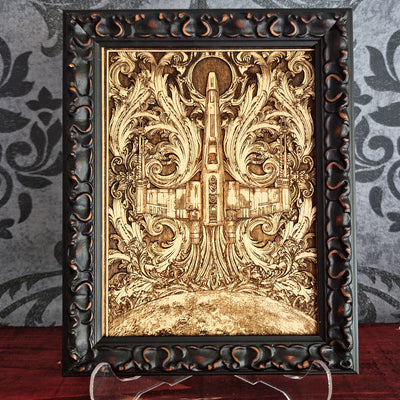 Wooden laser-cut artwork featuring a detailed depiction of a spaceship, surrounded by ornate, swirling floral patterns. The artwork is framed and has a natural wood color, with intricate details and a vintage aesthetic.