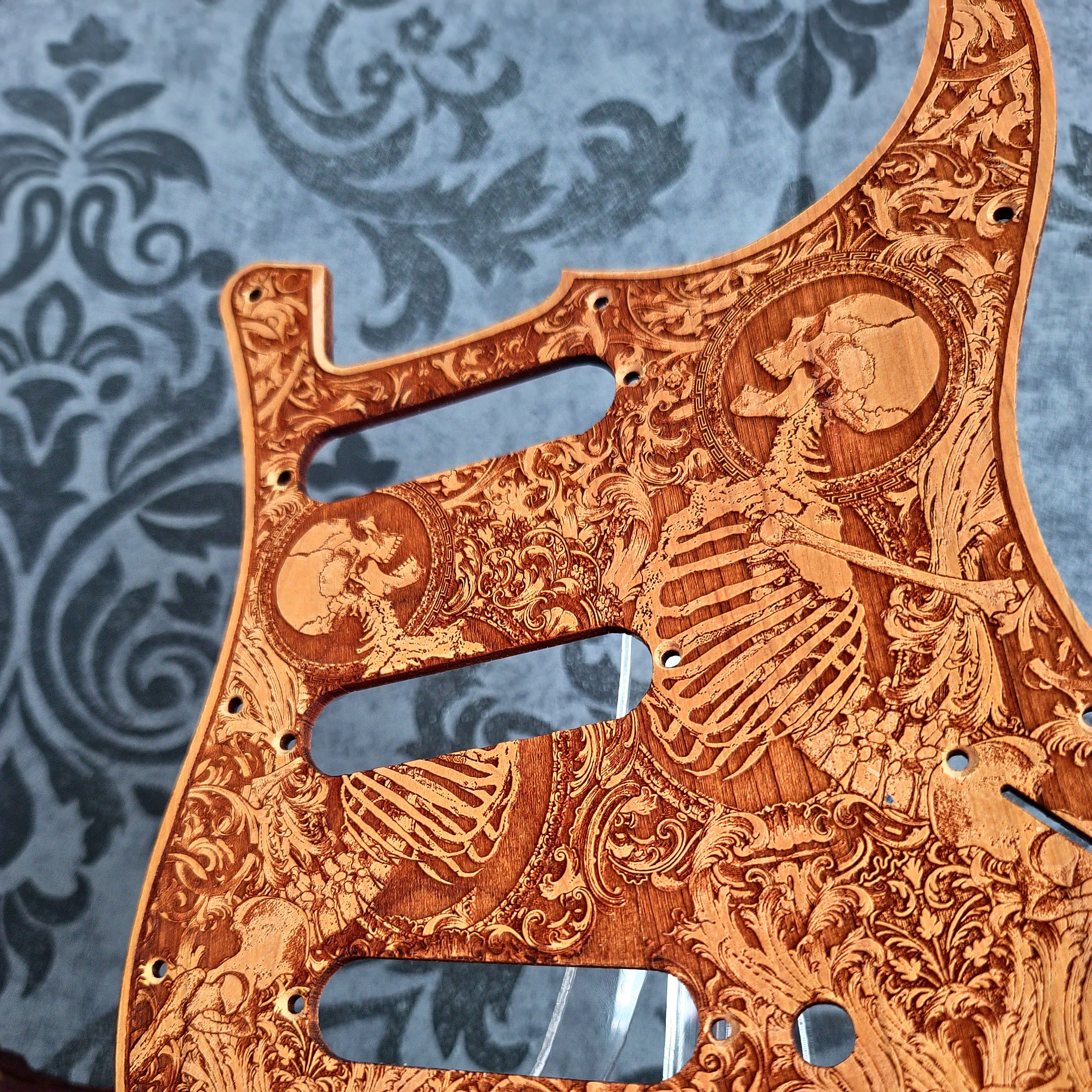 Cherry wood pickguard for Fender Strato, laser engraved, handcrafted design