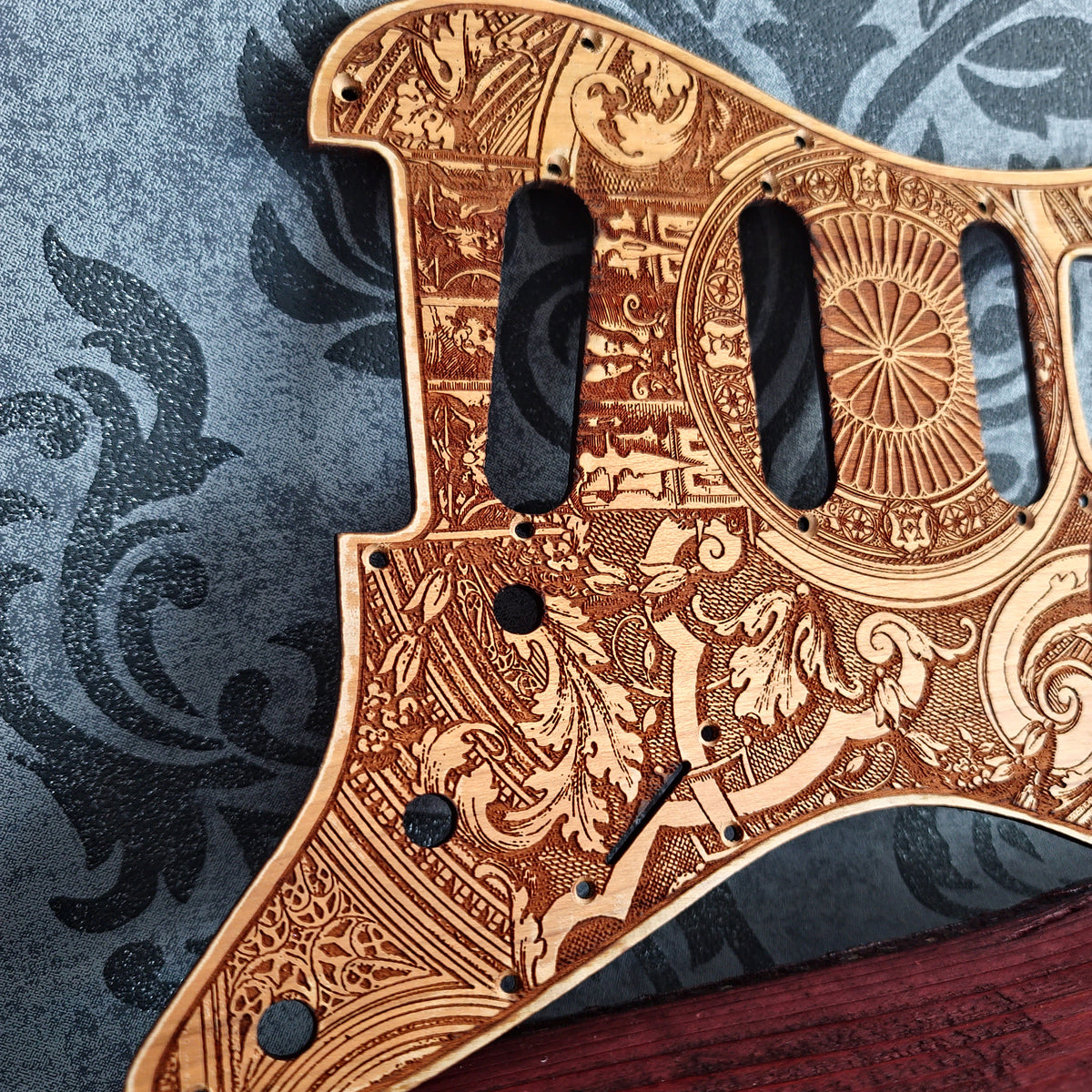 Made to order wooden Stratocaster pickguard with custom laser engraving
