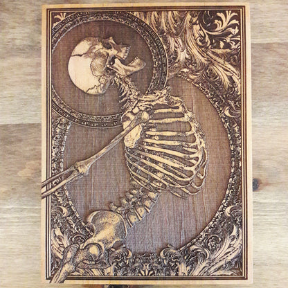  Hand-engraved skeleton artwork on wood, gothic-inspired mini wall art, perfect for horror lovers and alternative decor.