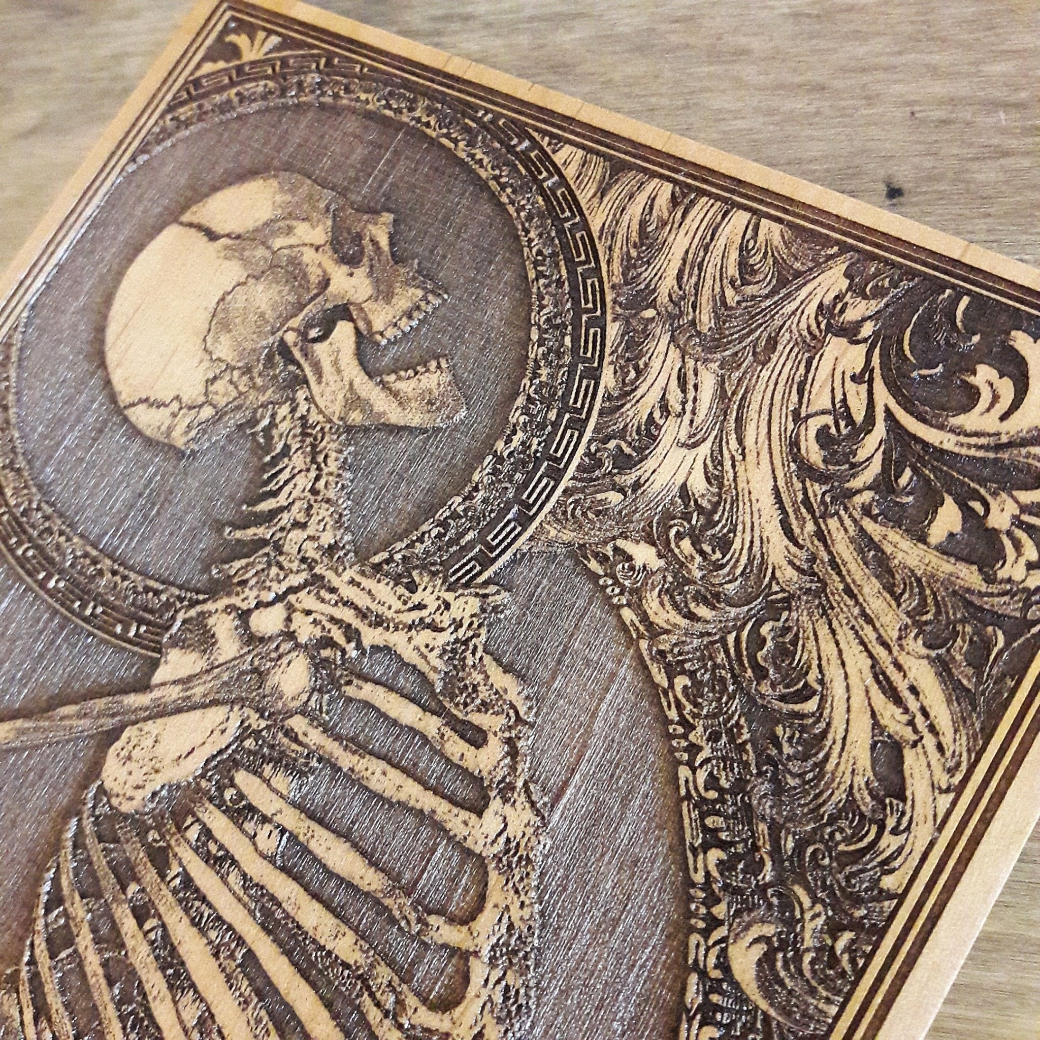 Dark art wood engraving featuring a skeleton, unique gothic artwork for spooky and alternative interior design.