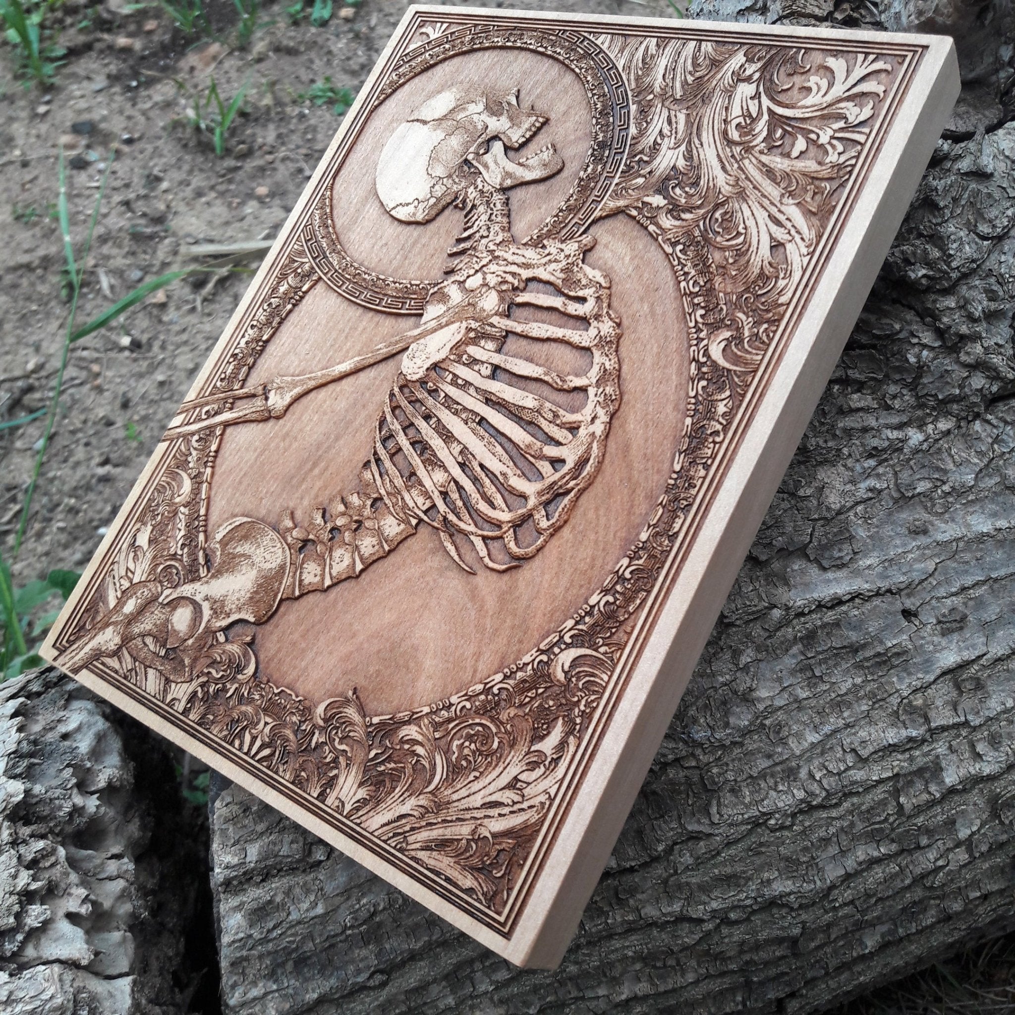 Handcrafted wooden skeleton engraving, an eerie and intricate piece of gothic wall art for horror-themed spaces.